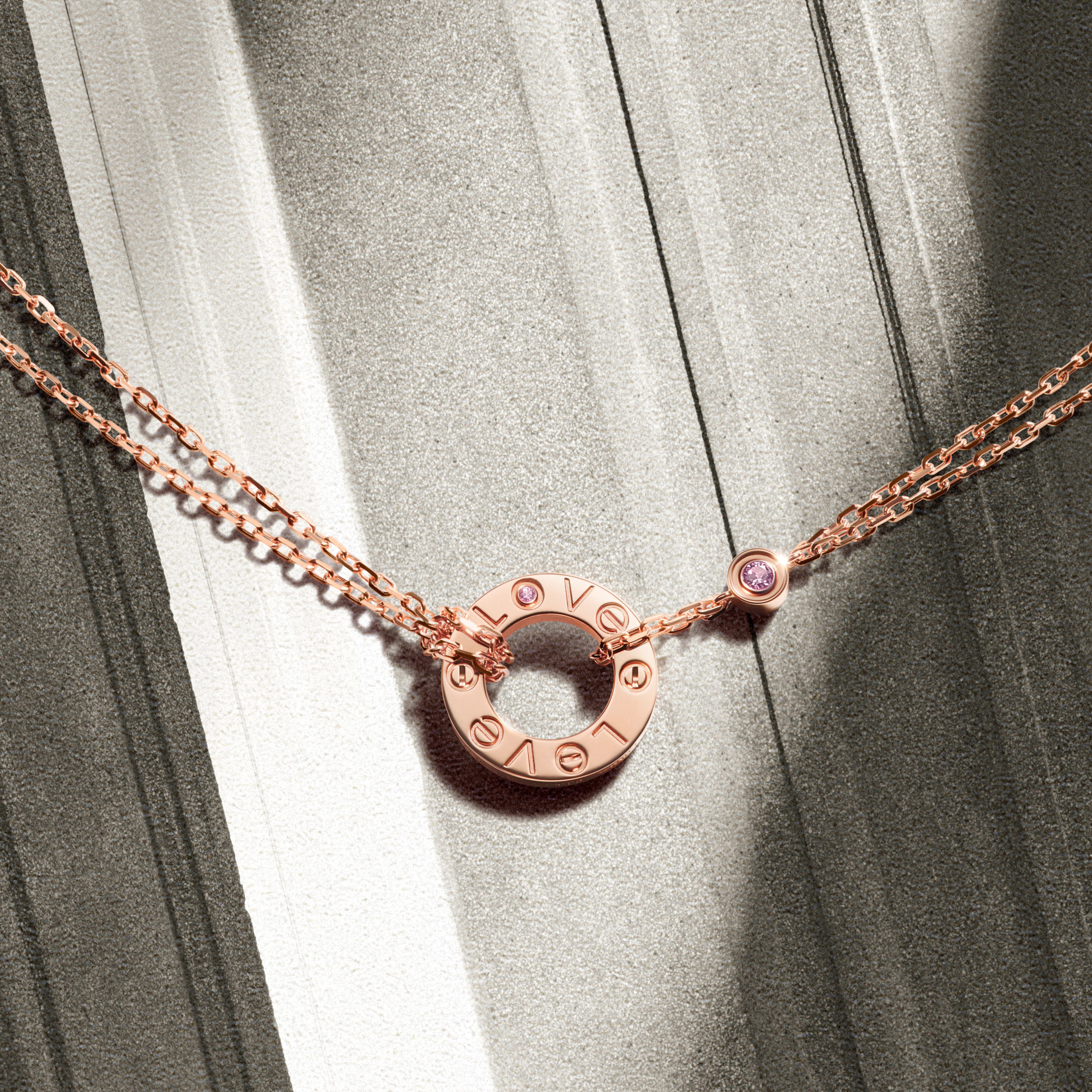 Cartier LOVE 520 special edition necklace in rose gold with pink sapphire